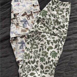 Norani Swaddle Sacks with Dog and Leaf Patterns